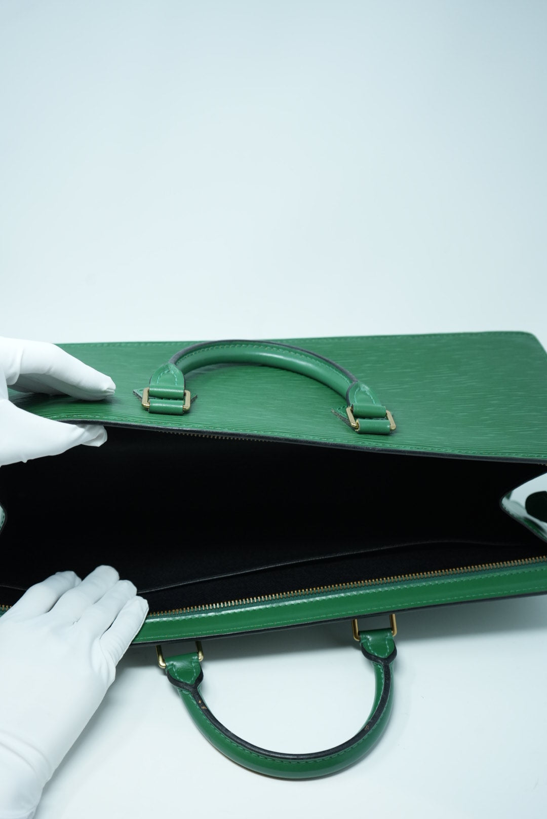 Louis Vuitton Sac Triangle Handbag