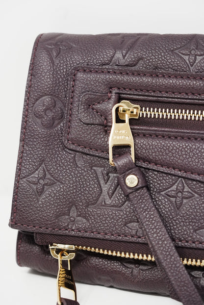 Louis Vuitton monogram empreinte petillante clutch