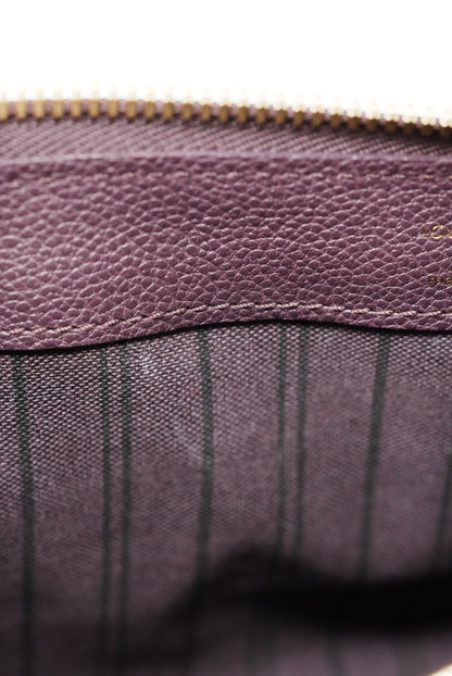 Louis Vuitton monogram empreinte petillante clutch