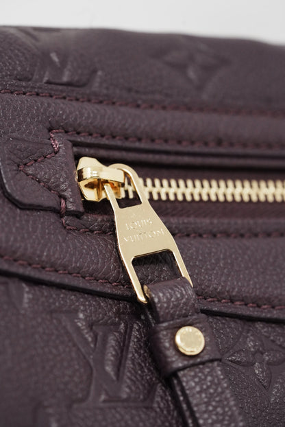 Louis Vuitton monogram empreinte petillante clutch