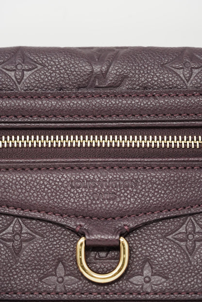 Louis Vuitton monogram empreinte petillante clutch