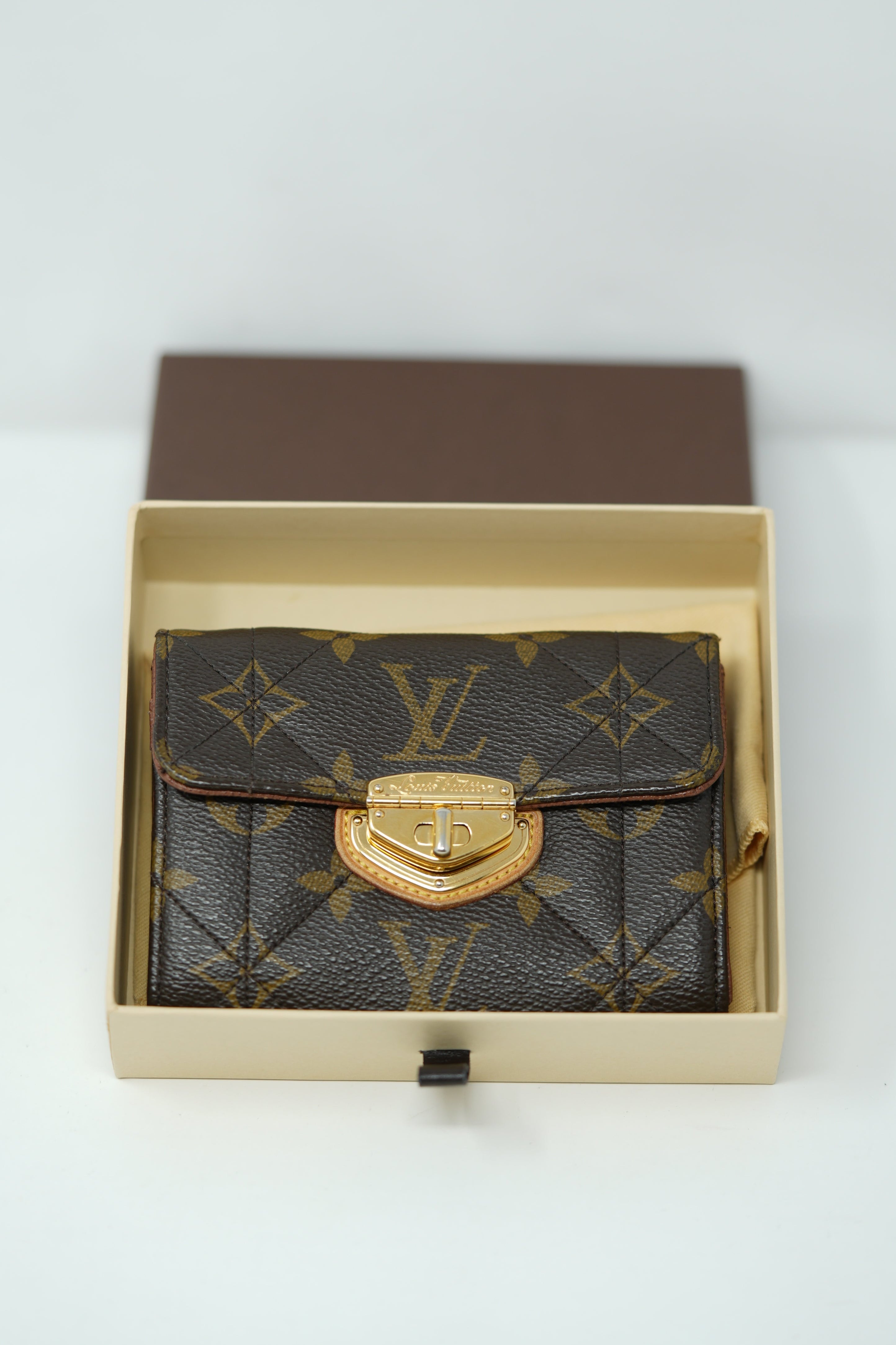 Louis Vuitton 2010 Brown Monogram Canvas Etoile Portefeuille Wallet
