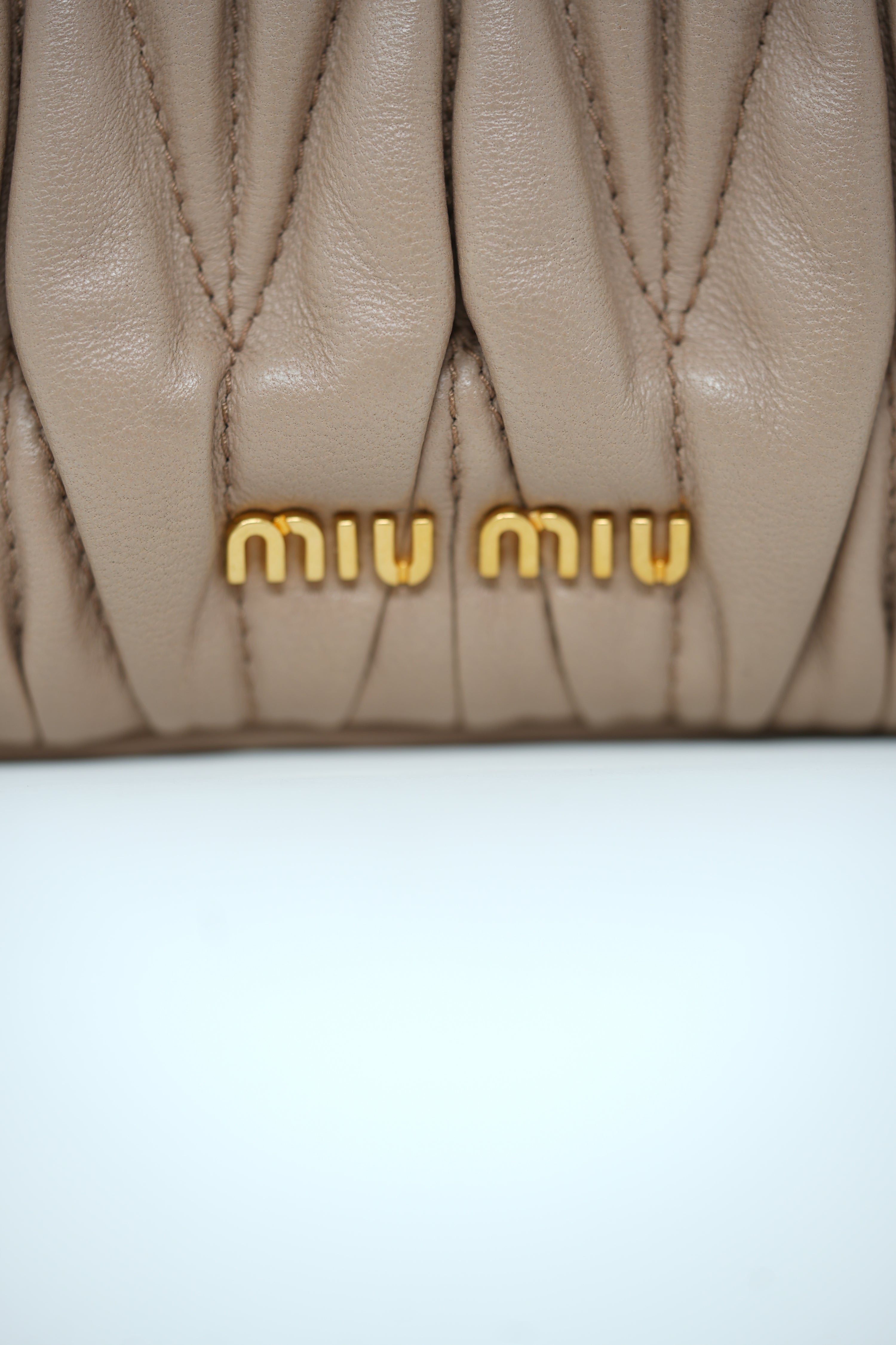 Miu Miu Nappa Matelasse Clutch Bag Beige