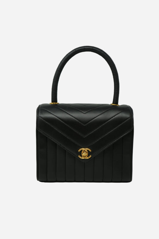 Pre-Owned Chanel 1989–1991 Black Lambskin Chevron Quilted Mini Top Handle Bag