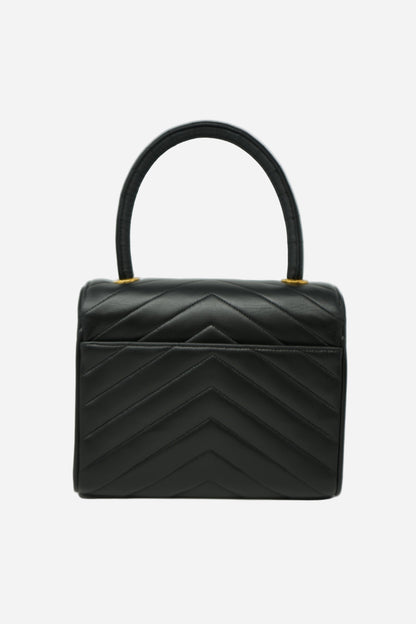 Pre-Owned Chanel 1989–1991 Black Lambskin Chevron Quilted Mini Top Handle Bag