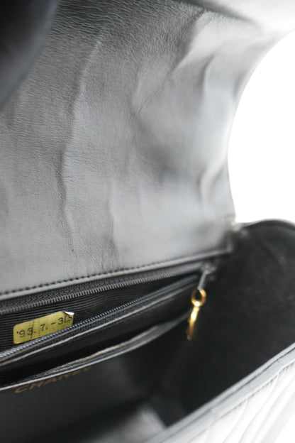 Pre-Owned Chanel 1989–1991 Black Lambskin Chevron Quilted Mini Top Handle Bag
