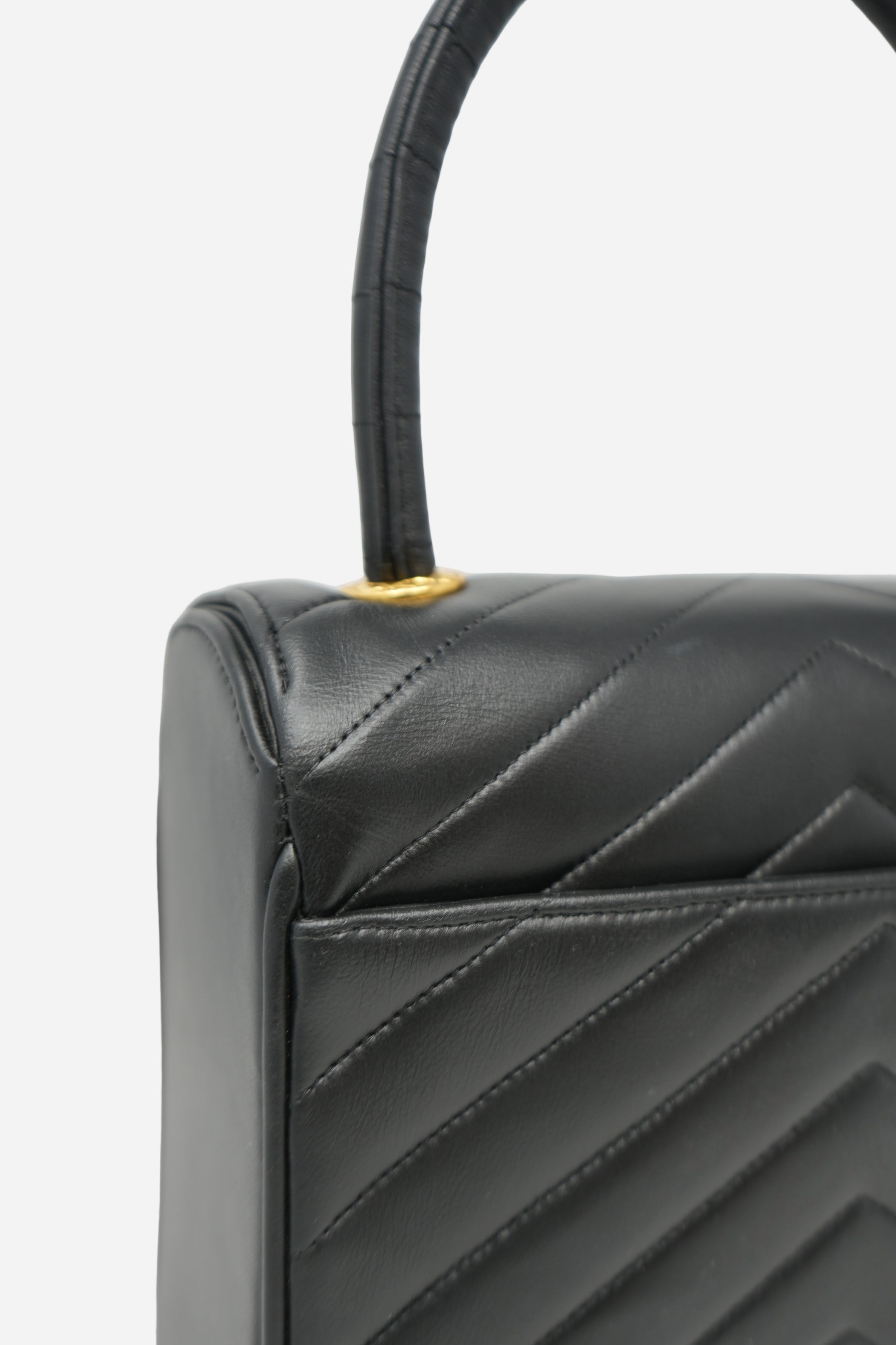 Pre-Owned Chanel 1989–1991 Black Lambskin Chevron Quilted Mini Top Handle Bag