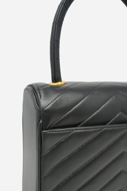 Pre-Owned Chanel 1989–1991 Black Lambskin Chevron Quilted Mini Top Handle Bag