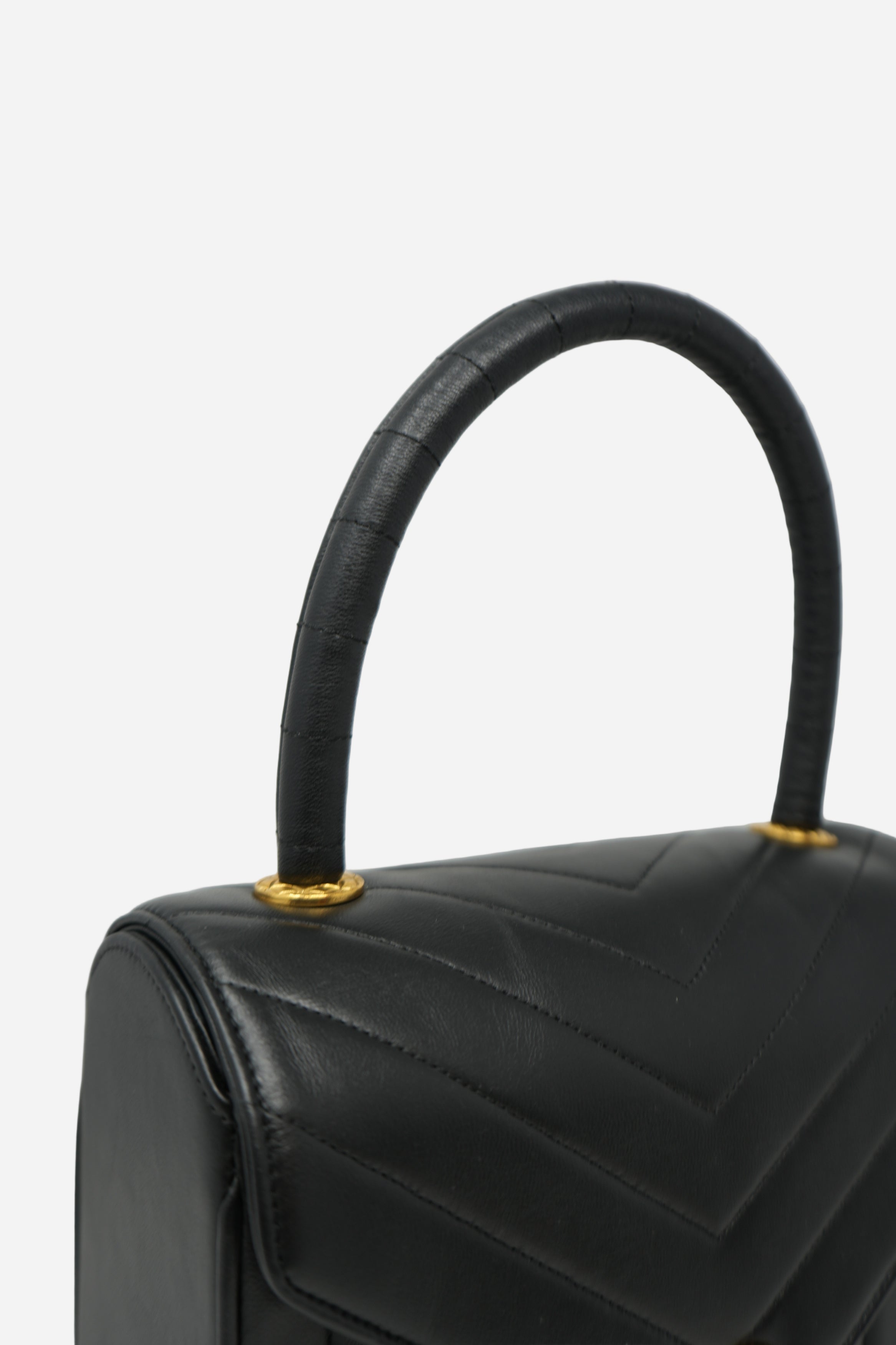 Pre-Owned Chanel 1989–1991 Black Lambskin Chevron Quilted Mini Top Handle Bag