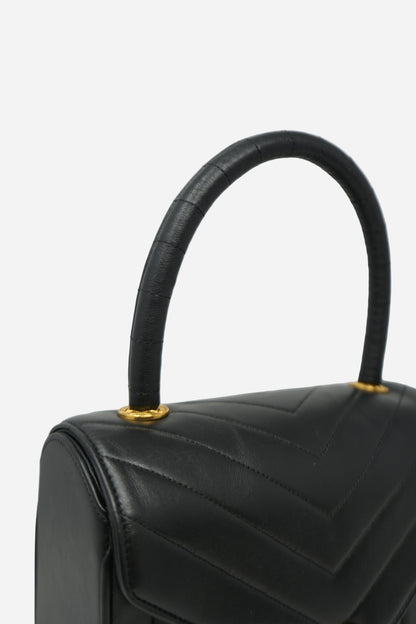 Pre-Owned Chanel 1989–1991 Black Lambskin Chevron Quilted Mini Top Handle Bag