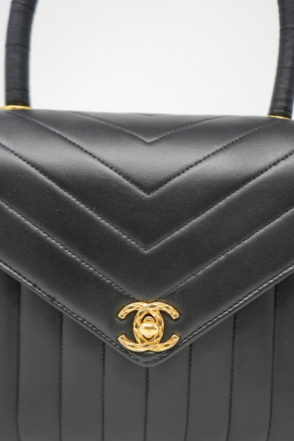 Pre-Owned Chanel 1989–1991 Black Lambskin Chevron Quilted Mini Top Handle Bag